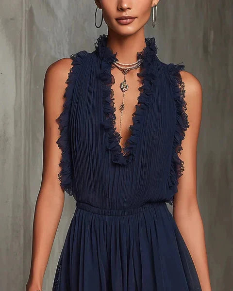 Adriana | Mono navy in chiffon plissettato con pizzo